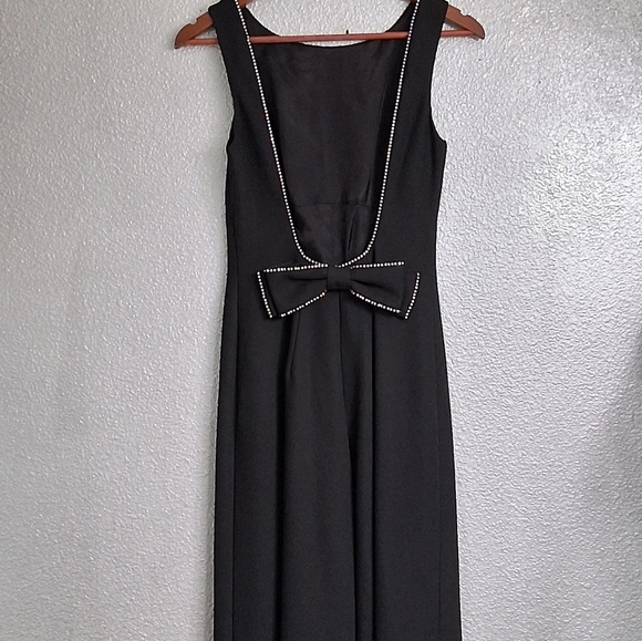 Cach`e Black Jumpsuit With A Scoop Back Outlined With Rhinestones   Size 6 - Picture 8 of 16